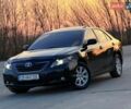 Черный Тойота Камри, объемом двигателя 2.4 л и пробегом 345 тыс. км за 8200 $, фото 1 на Automoto.ua