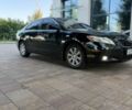 Черный Тойота Камри, объемом двигателя 2.4 л и пробегом 211 тыс. км за 8500 $, фото 1 на Automoto.ua
