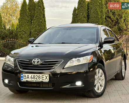Черный Тойота Камри, объемом двигателя 3.46 л и пробегом 187 тыс. км за 11300 $, фото 1 на Automoto.ua