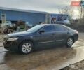 Черный Тойота Камри, объемом двигателя 2.36 л и пробегом 280 тыс. км за 6900 $, фото 1 на Automoto.ua