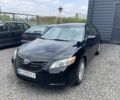 Черный Тойота Камри, объемом двигателя 2.4 л и пробегом 330 тыс. км за 6550 $, фото 1 на Automoto.ua