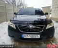 Черный Тойота Камри, объемом двигателя 2.4 л и пробегом 23100 тыс. км за 9200 $, фото 1 на Automoto.ua