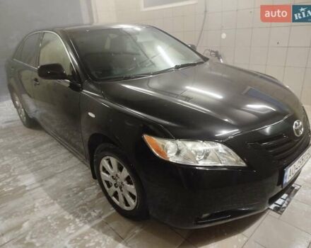 Черный Тойота Камри, объемом двигателя 2.36 л и пробегом 245 тыс. км за 8300 $, фото 1 на Automoto.ua