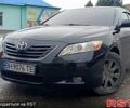 Черный Тойота Камри, объемом двигателя 2.4 л и пробегом 242 тыс. км за 7500 $, фото 1 на Automoto.ua