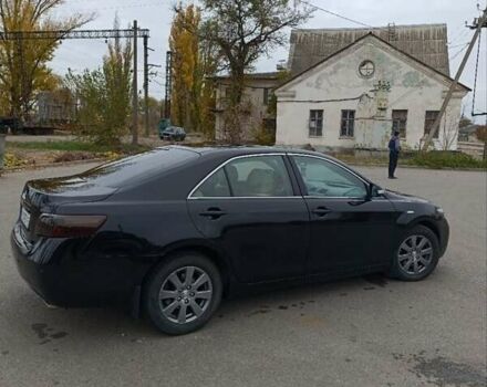 Черный Тойота Камри, объемом двигателя 2.4 л и пробегом 325 тыс. км за 7300 $, фото 7 на Automoto.ua