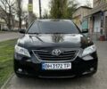 Черный Тойота Камри, объемом двигателя 2.4 л и пробегом 197 тыс. км за 8500 $, фото 1 на Automoto.ua