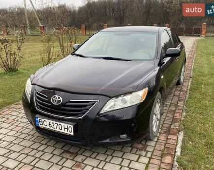 Черный Тойота Камри, объемом двигателя 2.4 л и пробегом 227 тыс. км за 8600 $, фото 20 на Automoto.ua