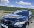 Чорний Тойота Камрі, об'ємом двигуна 2.4 л та пробігом 319 тис. км за 8000 $, фото 1 на Automoto.ua