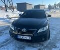 Черный Тойота Камри, объемом двигателя 2.4 л и пробегом 380 тыс. км за 8500 $, фото 1 на Automoto.ua