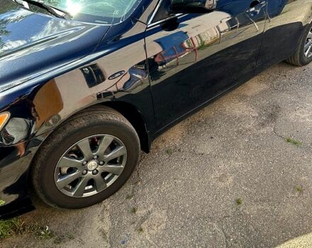 Черный Тойота Камри, объемом двигателя 2.4 л и пробегом 220 тыс. км за 8500 $, фото 1 на Automoto.ua