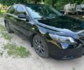 Черный Тойота Камри, объемом двигателя 2.4 л и пробегом 260 тыс. км за 8200 $, фото 1 на Automoto.ua