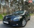 Черный Тойота Камри, объемом двигателя 2.36 л и пробегом 230 тыс. км за 7999 $, фото 1 на Automoto.ua