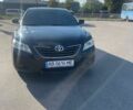 Черный Тойота Камри, объемом двигателя 2.36 л и пробегом 325 тыс. км за 6850 $, фото 1 на Automoto.ua