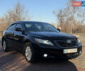 Черный Тойота Камри, объемом двигателя 2.36 л и пробегом 165 тыс. км за 9000 $, фото 1 на Automoto.ua