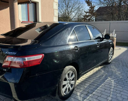 Чорний Тойота Камрі, об'ємом двигуна 3.46 л та пробігом 153 тис. км за 11200 $, фото 2 на Automoto.ua