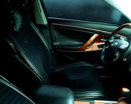 Черный Тойота Камри, объемом двигателя 3.5 л и пробегом 255 тыс. км за 11800 $, фото 24 на Automoto.ua