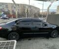 Черный Тойота Камри, объемом двигателя 2.4 л и пробегом 235 тыс. км за 9500 $, фото 6 на Automoto.ua