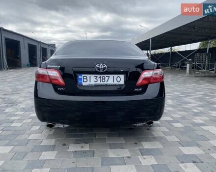 Чорний Тойота Камрі, об'ємом двигуна 3.46 л та пробігом 336 тис. км за 8900 $, фото 3 на Automoto.ua