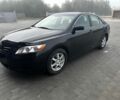 Чорний Тойота Камрі, об'ємом двигуна 2.4 л та пробігом 210 тис. км за 4550 $, фото 1 на Automoto.ua
