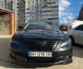 Черный Тойота Камри, объемом двигателя 2.4 л и пробегом 286 тыс. км за 8000 $, фото 1 на Automoto.ua