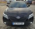 Черный Тойота Камри, объемом двигателя 3.5 л и пробегом 255 тыс. км за 11800 $, фото 1 на Automoto.ua