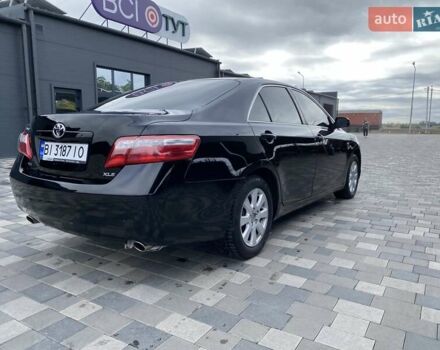 Чорний Тойота Камрі, об'ємом двигуна 3.46 л та пробігом 336 тис. км за 8900 $, фото 1 на Automoto.ua