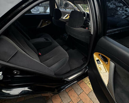 Черный Тойота Камри, объемом двигателя 2.36 л и пробегом 308 тыс. км за 7400 $, фото 10 на Automoto.ua