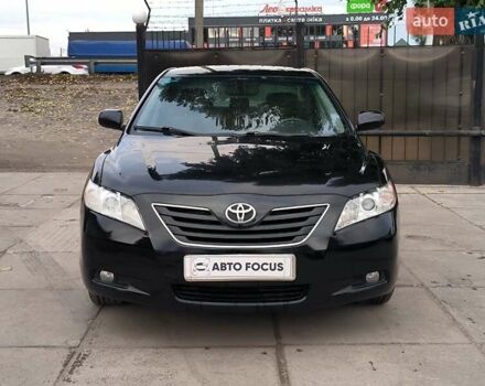 Черный Тойота Камри, объемом двигателя 2.4 л и пробегом 304 тыс. км за 6990 $, фото 1 на Automoto.ua