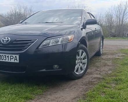 Чорний Тойота Камрі, об'ємом двигуна 2.4 л та пробігом 270 тис. км за 8500 $, фото 1 на Automoto.ua
