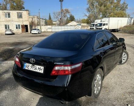 Чорний Тойота Камрі, об'ємом двигуна 2.4 л та пробігом 251 тис. км за 8899 $, фото 1 на Automoto.ua