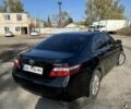 Чорний Тойота Камрі, об'ємом двигуна 2.4 л та пробігом 251 тис. км за 8899 $, фото 1 на Automoto.ua