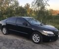 Черный Тойота Камри, объемом двигателя 2.4 л и пробегом 193 тыс. км за 9000 $, фото 1 на Automoto.ua
