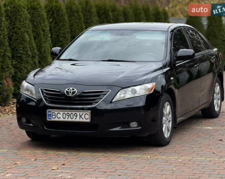 Черный Тойота Камри, объемом двигателя 2.36 л и пробегом 308 тыс. км за 7400 $, фото 1 на Automoto.ua