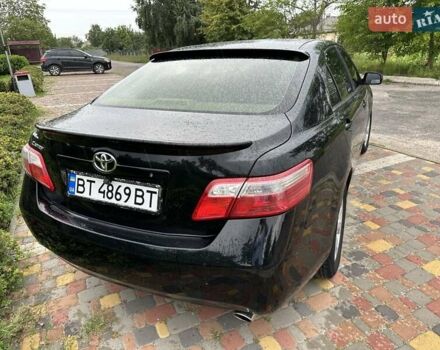 Черный Тойота Камри, объемом двигателя 2.4 л и пробегом 146 тыс. км за 9500 $, фото 4 на Automoto.ua