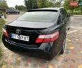 Черный Тойота Камри, объемом двигателя 2.4 л и пробегом 146 тыс. км за 9500 $, фото 4 на Automoto.ua