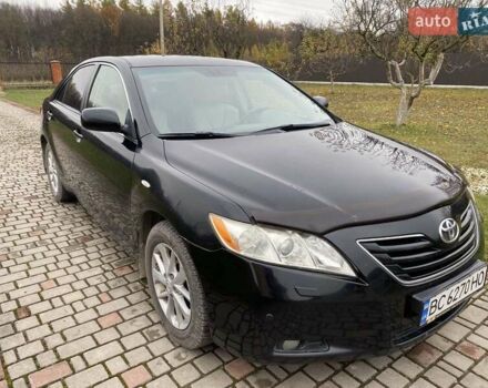 Черный Тойота Камри, объемом двигателя 2.4 л и пробегом 227 тыс. км за 8600 $, фото 21 на Automoto.ua