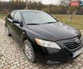 Черный Тойота Камри, объемом двигателя 2.4 л и пробегом 227 тыс. км за 8600 $, фото 21 на Automoto.ua