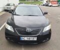 Черный Тойота Камри, объемом двигателя 2.4 л и пробегом 176 тыс. км за 8300 $, фото 1 на Automoto.ua