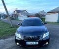 Черный Тойота Камри, объемом двигателя 2.4 л и пробегом 259 тыс. км за 7800 $, фото 1 на Automoto.ua