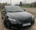 Черный Тойота Камри, объемом двигателя 2.4 л и пробегом 214 тыс. км за 7200 $, фото 1 на Automoto.ua
