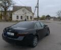 Черный Тойота Камри, объемом двигателя 2.4 л и пробегом 325 тыс. км за 7300 $, фото 2 на Automoto.ua
