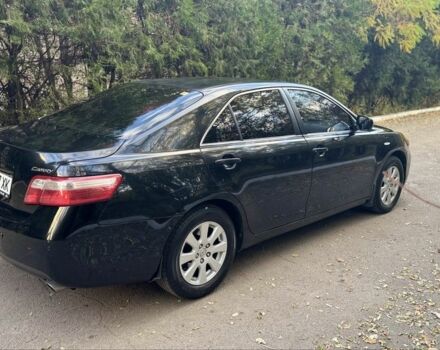 Чорний Тойота Камрі, об'ємом двигуна 2.4 л та пробігом 350 тис. км за 6399 $, фото 4 на Automoto.ua