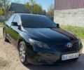 Черный Тойота Камри, объемом двигателя 2.4 л и пробегом 223 тыс. км за 7500 $, фото 1 на Automoto.ua