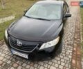 Черный Тойота Камри, объемом двигателя 2.4 л и пробегом 227 тыс. км за 8600 $, фото 12 на Automoto.ua