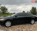 Черный Тойота Камри, объемом двигателя 2.4 л и пробегом 146 тыс. км за 9500 $, фото 2 на Automoto.ua