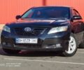 Чорний Тойота Камрі, об'ємом двигуна 2.4 л та пробігом 140 тис. км за 8999 $, фото 1 на Automoto.ua