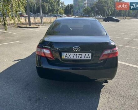 Черный Тойота Камри, объемом двигателя 2.36 л и пробегом 280 тыс. км за 8700 $, фото 1 на Automoto.ua