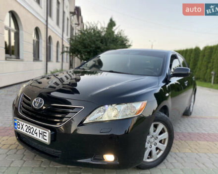 Чорний Тойота Камрі, об'ємом двигуна 2.4 л та пробігом 275 тис. км за 7750 $, фото 31 на Automoto.ua