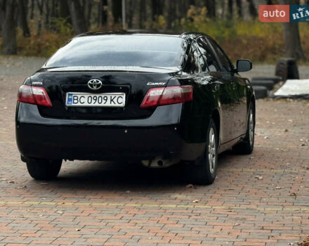 Черный Тойота Камри, объемом двигателя 2.36 л и пробегом 308 тыс. км за 7400 $, фото 2 на Automoto.ua