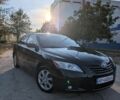 Чорний Тойота Камрі, об'ємом двигуна 2.36 л та пробігом 243 тис. км за 6799 $, фото 1 на Automoto.ua